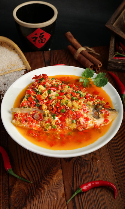 Fish head with chopped pepper