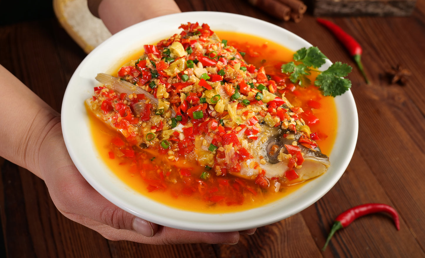 Fish head with chopped pepper